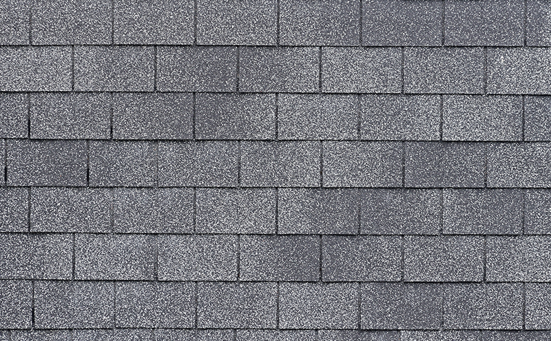 Close up of three tab shingles.