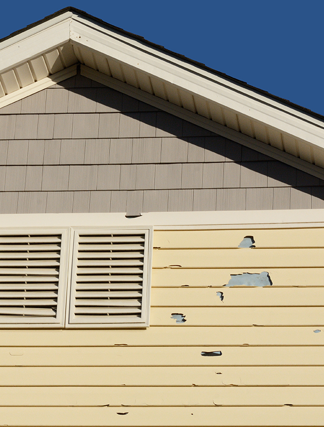 Siding damage of a residential home.