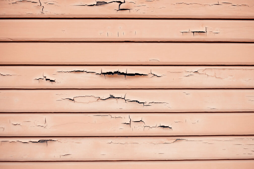 Exterior wall paneling chipping away.